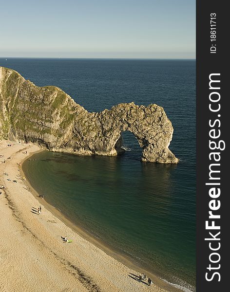 Looking over onto Durdle Door itself, and the beach. The famous limestone rock situated along the jurassic coast; near Lulworth, Dorset, southern England.