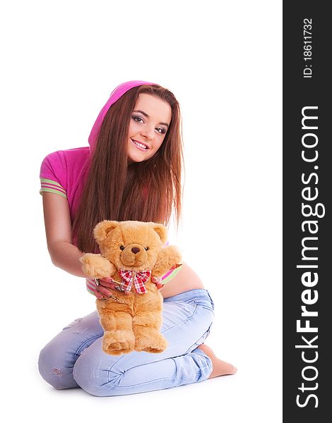 Beautiful longhair girl is holding the teddy bear. Beautiful longhair girl is holding the teddy bear