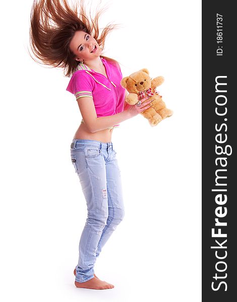 Beautiful longhair girl is holding the teddy bear. Beautiful longhair girl is holding the teddy bear