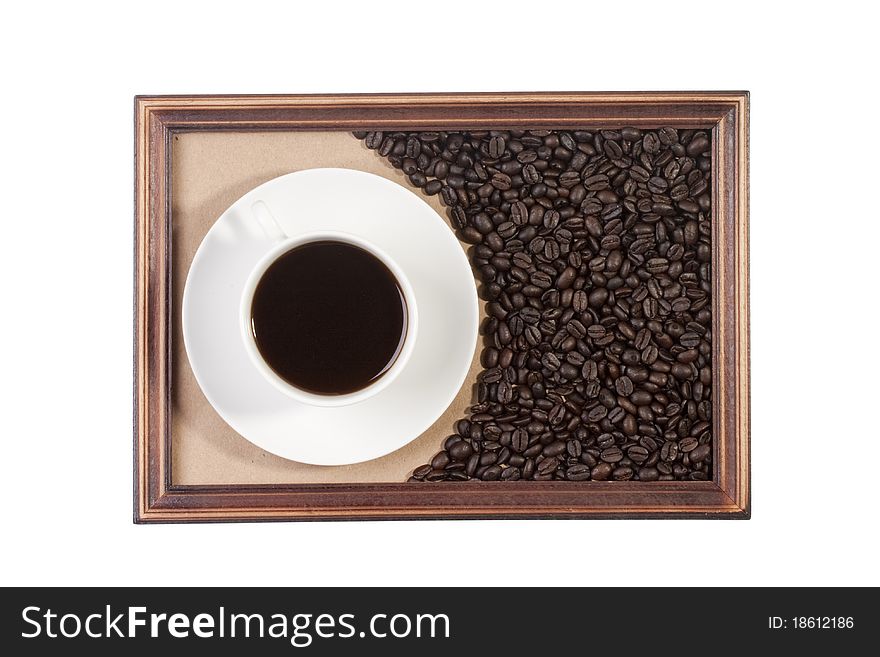 Wooden frame with paper craft in the background with a cup of coffee.
