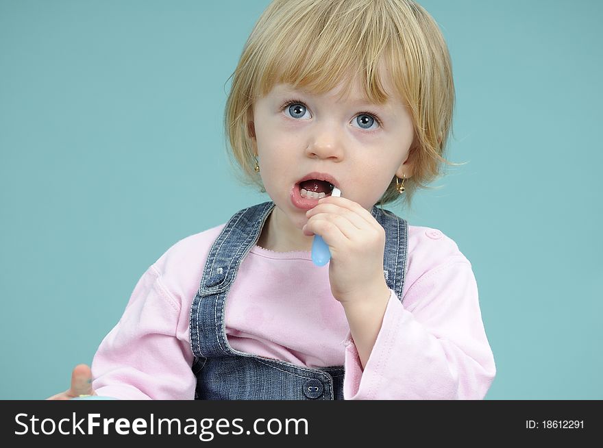 Baby Girl Brushing Teeth