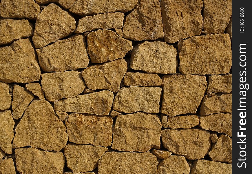 Brown texture background of stone wall