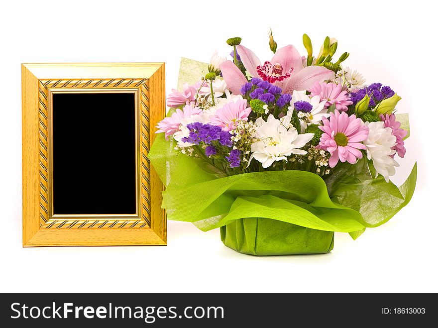 Beautiful bouquet and golden frame
