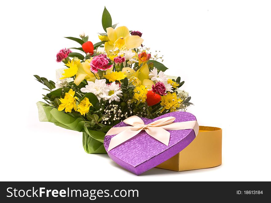 Magnificent bouquet and present box on a white