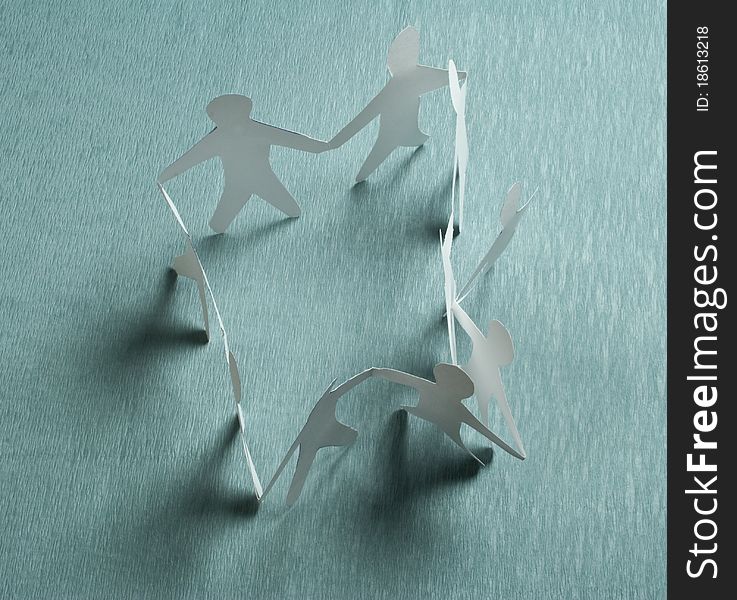 Paper team. Abstract human silhouettes