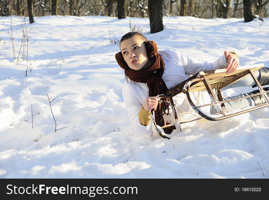 Woman having accident on sledge