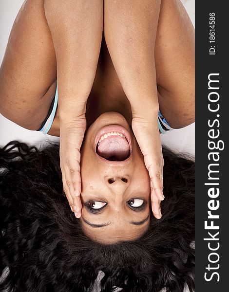 Woman Upside Down Hair Out Hands Face