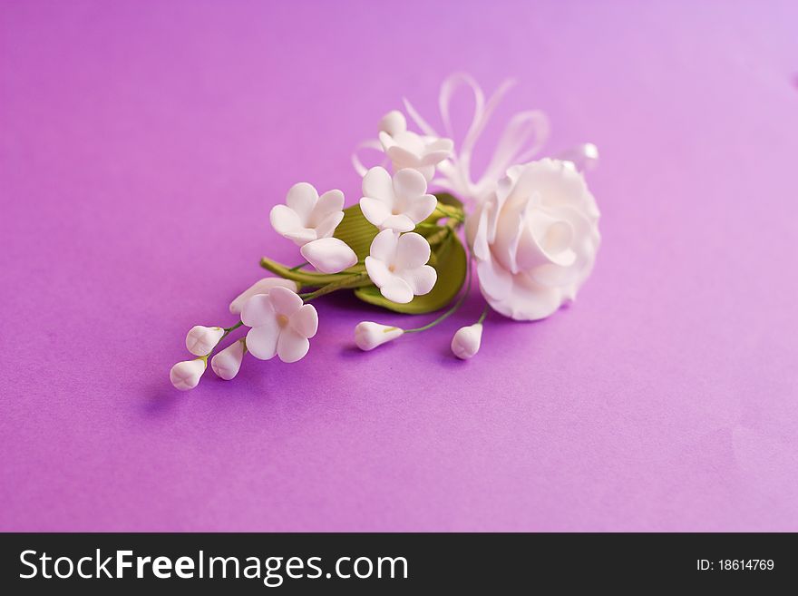 White flowers  on purple background