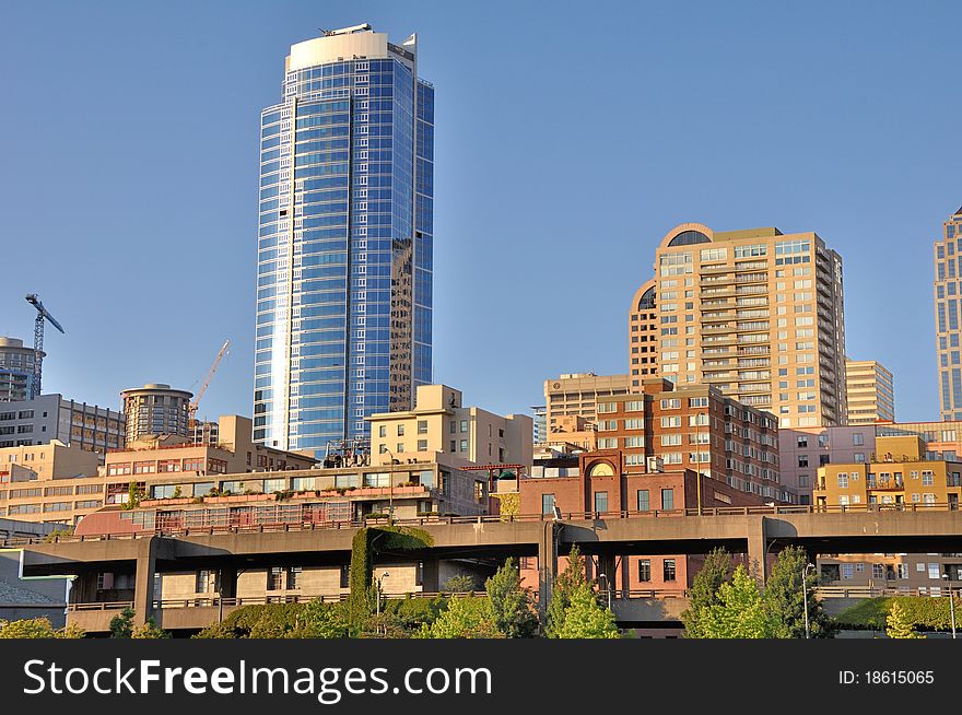 Downtown Seattle in the summer at noon, many styles of buildings. Downtown Seattle in the summer at noon, many styles of buildings.