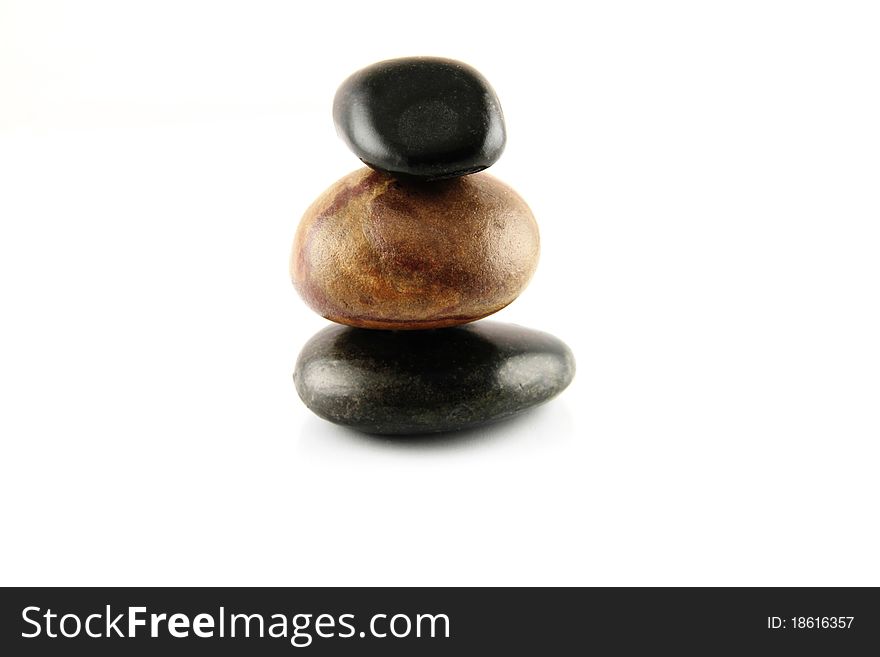 Stones stacked on top of each other isolated on a white background