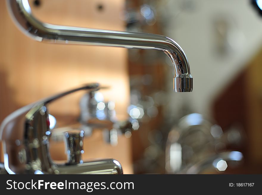 Silver metallic water tap in bathroom