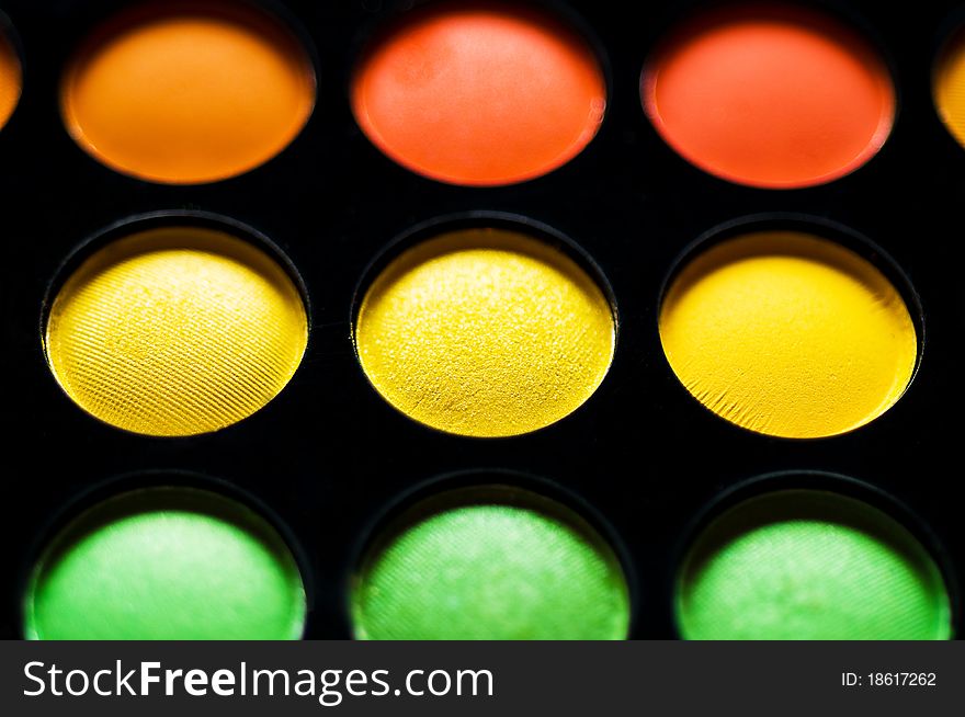 Palette of colorful eye shadows close-up. woman cosmetics.