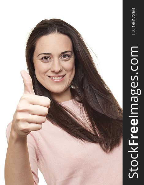 Portrait of a happy young lady showing a thumb up sign on isolated background