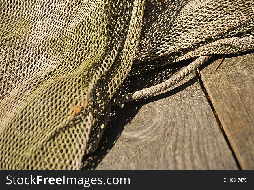 Old and decrepit fish net close up. Old and decrepit fish net close up