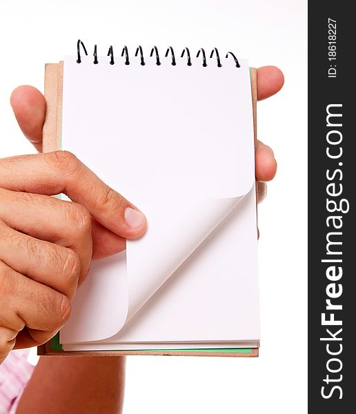 Hand showing a blank notebook with space in blank for insert text or design