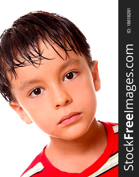 Boy looking at the camera over white background