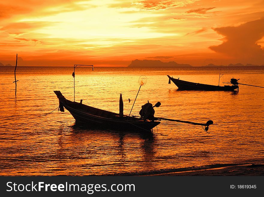 Sunset view motor boat silhouette colorful background. Sunset view motor boat silhouette colorful background