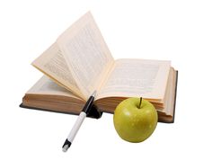 The Old Book With A Pen And An Apple Royalty Free Stock Photo