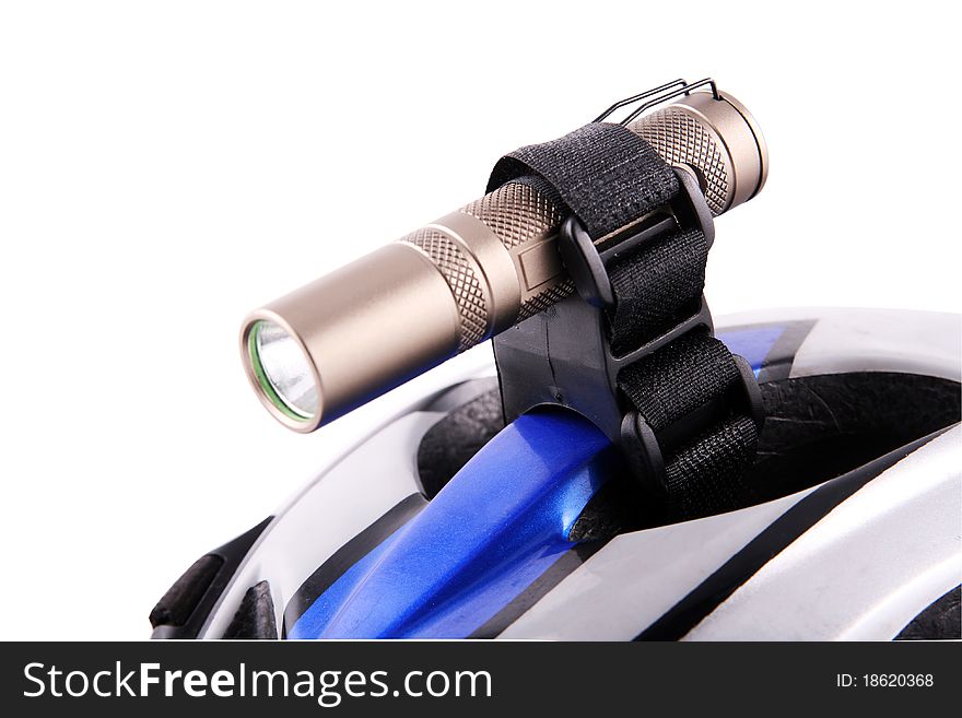 Lantern bicycle on a bicycle helmet with fastening on the isolated white background. Lantern bicycle on a bicycle helmet with fastening on the isolated white background