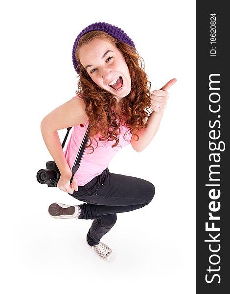 Beautiful teen girl alone with camra on white background