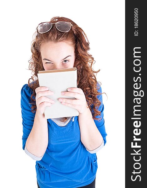 Beautiful teen girl with books on white background