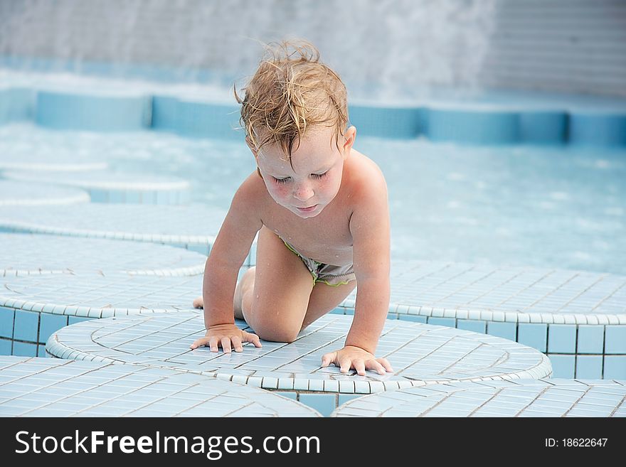 Cute child in outdoor water pool. Cute child in outdoor water pool