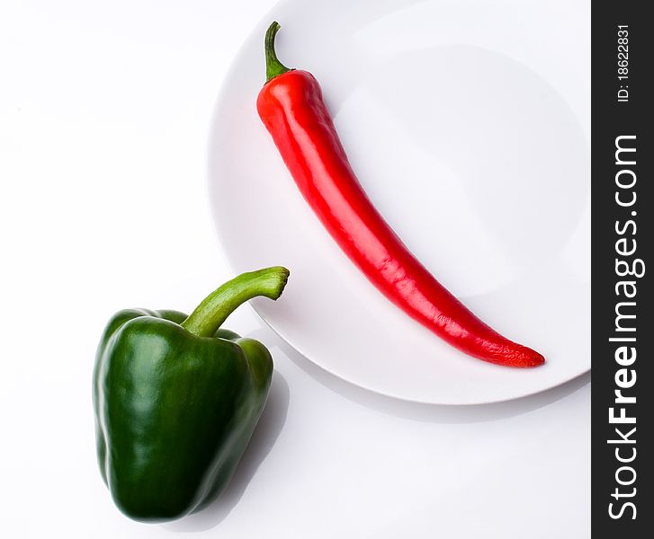 Red hot and green sweet peppers. Red hot and green sweet peppers