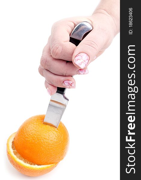 Knife and orange on a white background