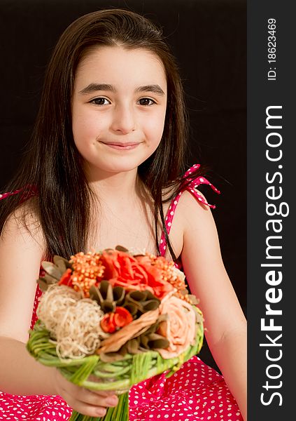 Little girl with orange flowers