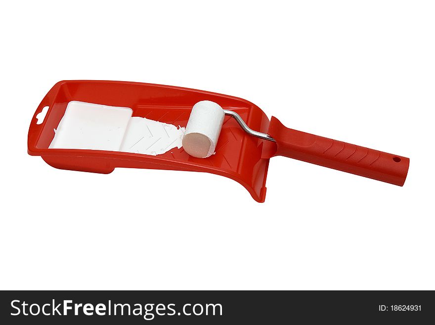 Paint roller and red tray isolated on white background