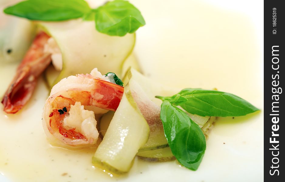 Studio close-up photography of a fried shrimp in a pear tree and decorated with sweet sauce mint leaves