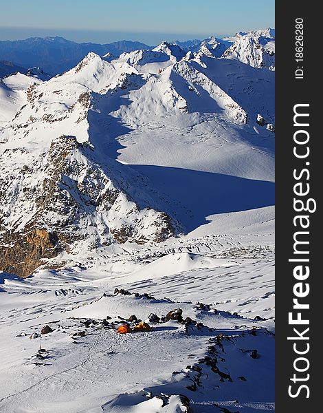 Tourists camp on a mountain Elbrus slope. The Caucasian mountains, Russia. Tourists camp on a mountain Elbrus slope. The Caucasian mountains, Russia