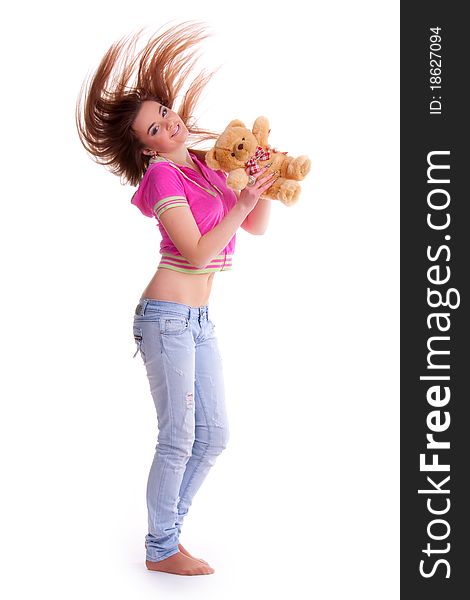 Beautiful longhair girl is holding the teddy bear. Beautiful longhair girl is holding the teddy bear