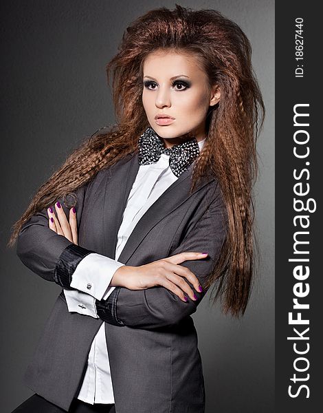 Elegant fashionable woman with bow-tie