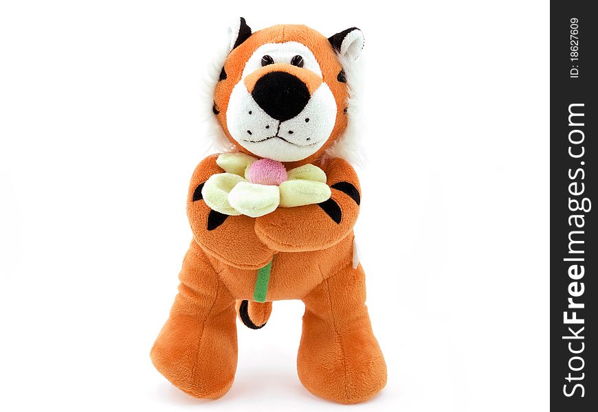 An orange toy tiger on a white background