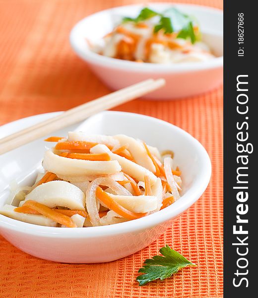 Marinated squid with carrot and onion. Marinated squid with carrot and onion