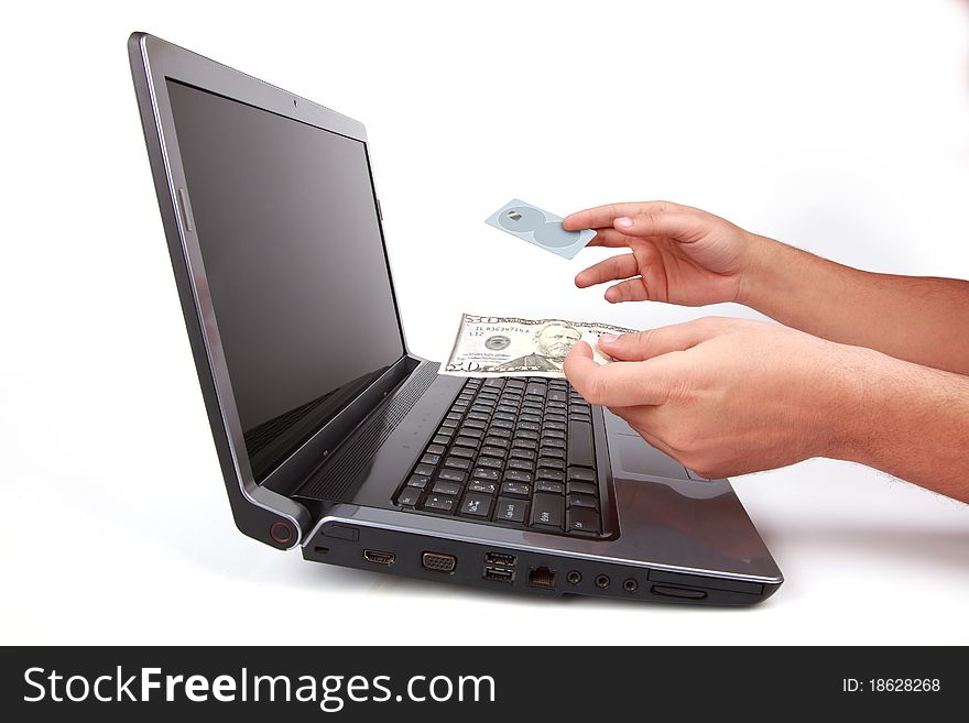 Laptop and Hand give Credit Card or money