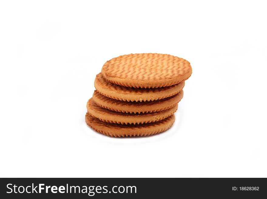 Five pieces of biscuits stacked pile on a white background