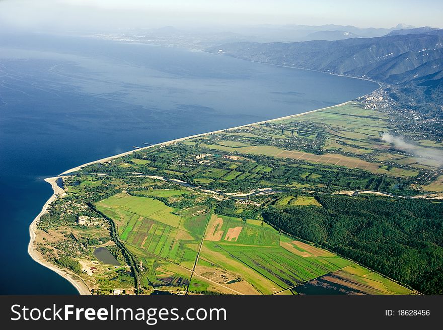 The Top View On Coast And Mountains