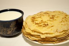 Pancakes And Milk Royalty Free Stock Image
