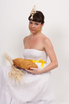 Girl With Bread And Ears Of Wheat Royalty Free Stock Photography Girl With Bread And Ears Of Wheat Royalty Free Stock Photography