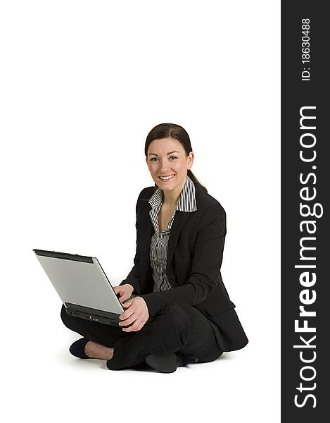 Pretty Young Businesswoman  With A Laptop On White