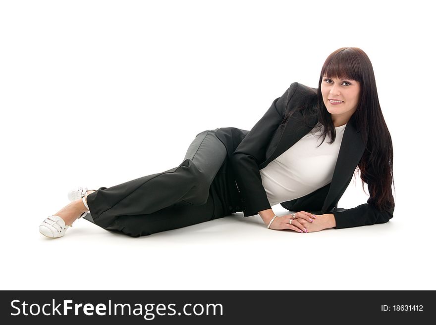 Businesswoman in suit lies, on white background.