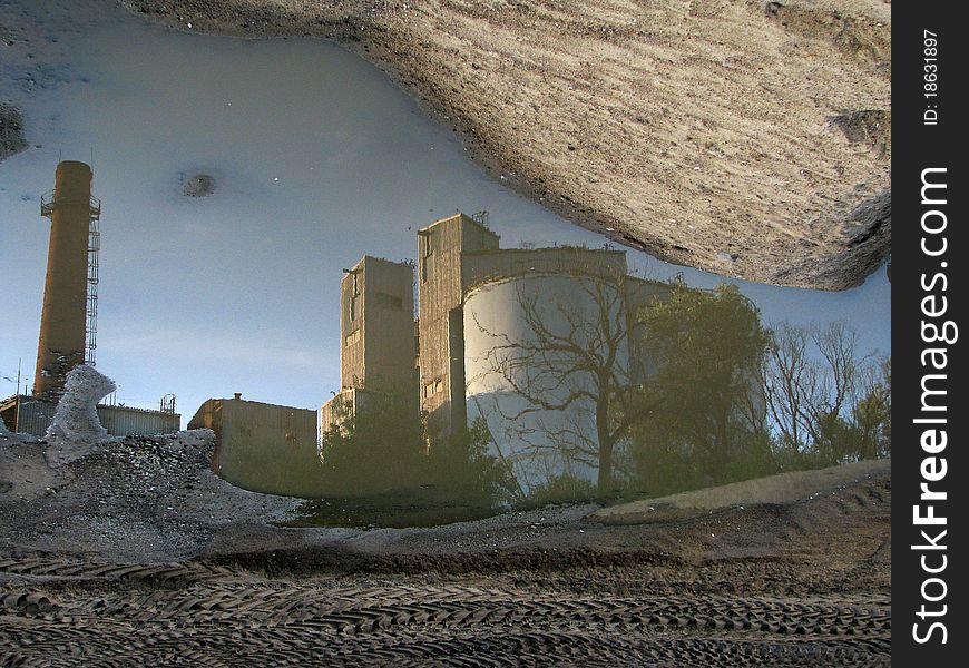 Reflection of industrial buildings in water. Reflection of industrial buildings in water