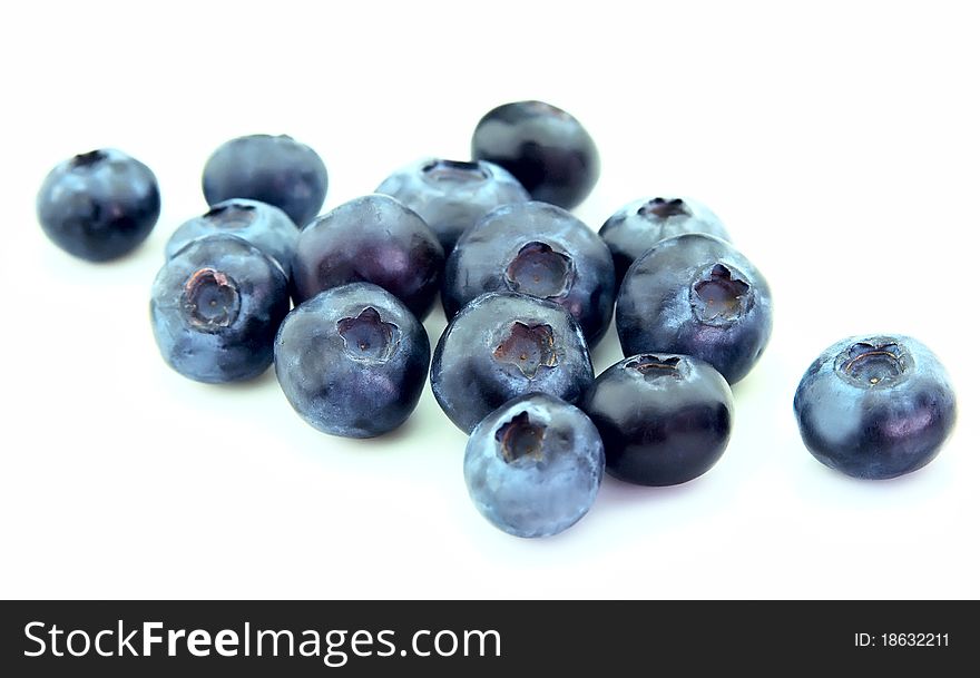 Bilberries on white background closeup