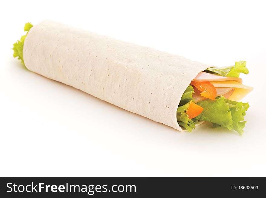 Roll sandwich with ham, cheese and vegetables. Roll sandwich with ham, cheese and vegetables