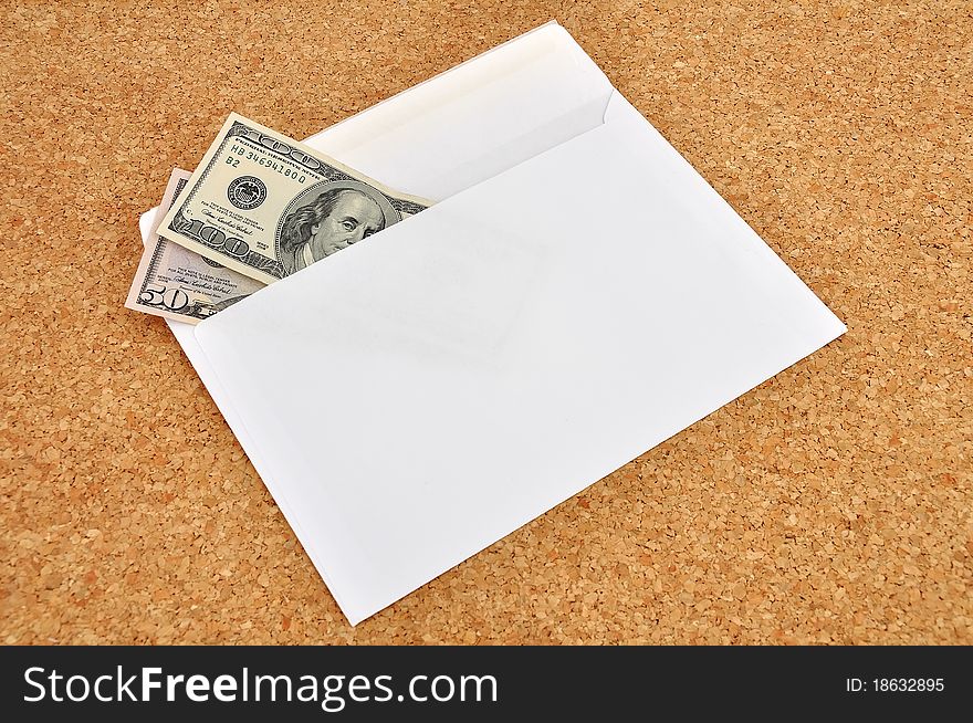 Dollars in an envelope