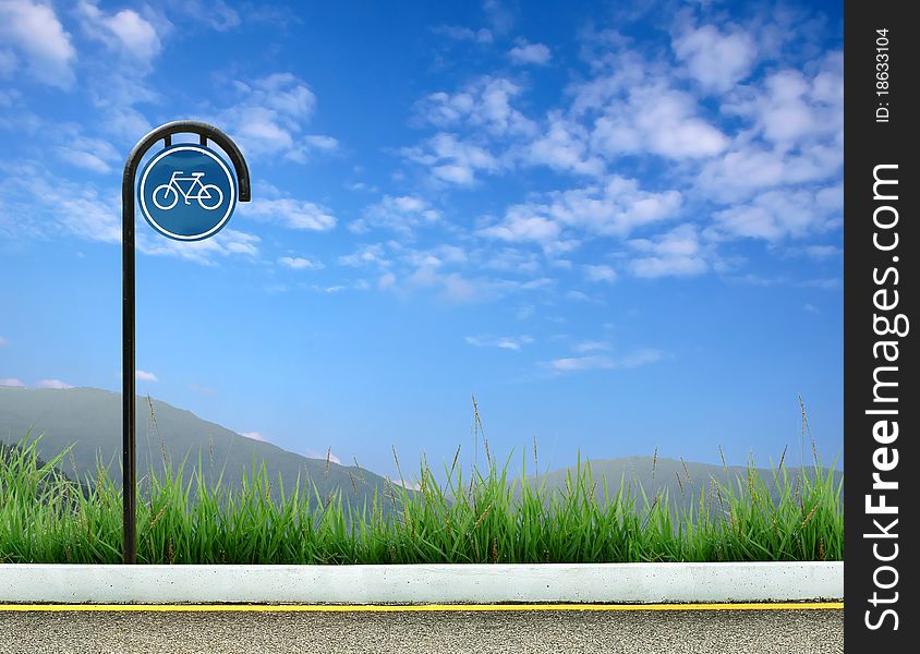 Bicycle sign and roadside landscape