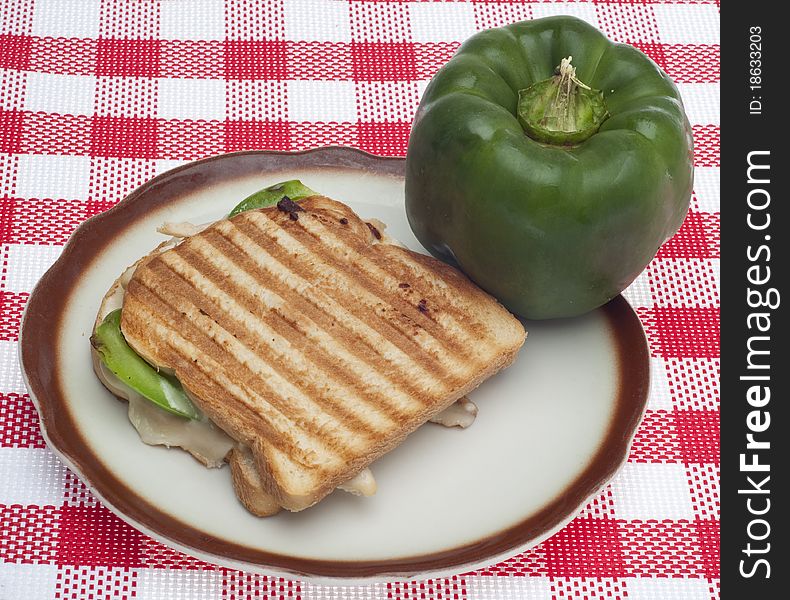 Panini Sandwich Toasted and Made with Green Bell Peppers.