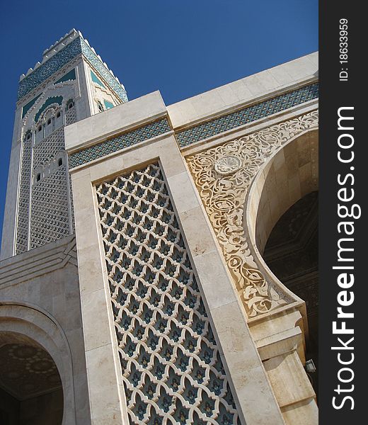 Looking up at the tower of the mosque of Hassan II in Casablanca, Morocco. Looking up at the tower of the mosque of Hassan II in Casablanca, Morocco